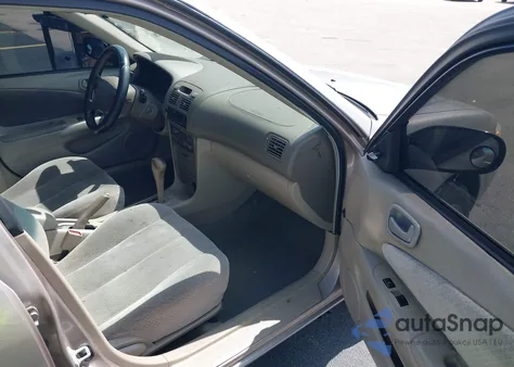 1999 Toyota Corolla Ce/Le/Ve из США, поврежденный, VIN 1NXBR12E5X2191135